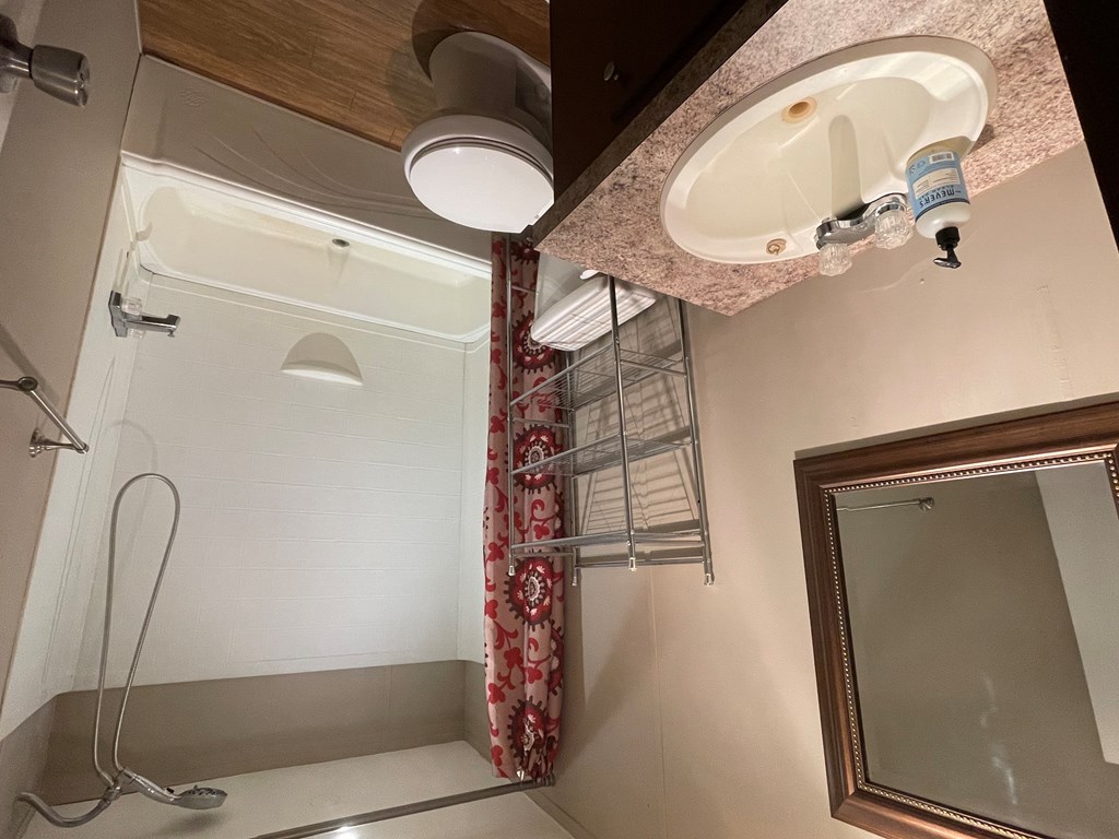 89 Kanati Trail Murphy, NC 28906 - Photo 23 of 30 a bathroom with a sink and mirror