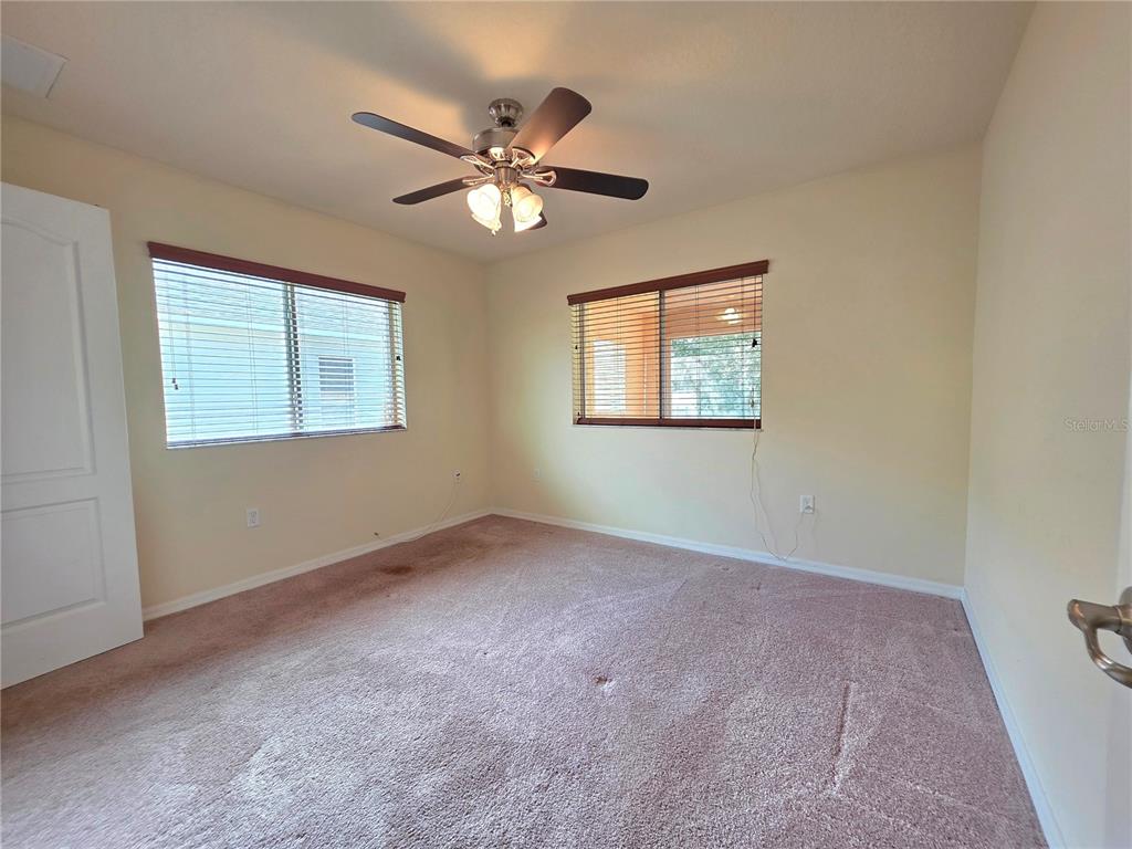 4284 High Ridge Avenue Spring Hill, FL 34609 - Photo 32 of 40 a view of an empty room with a window