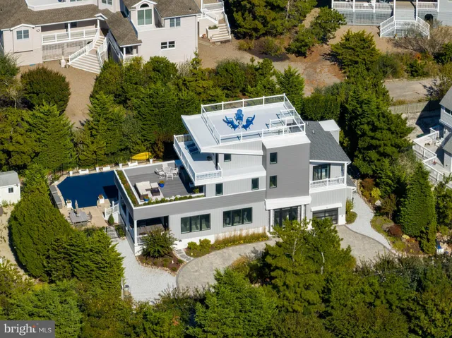 an aerial view of a house with a garden