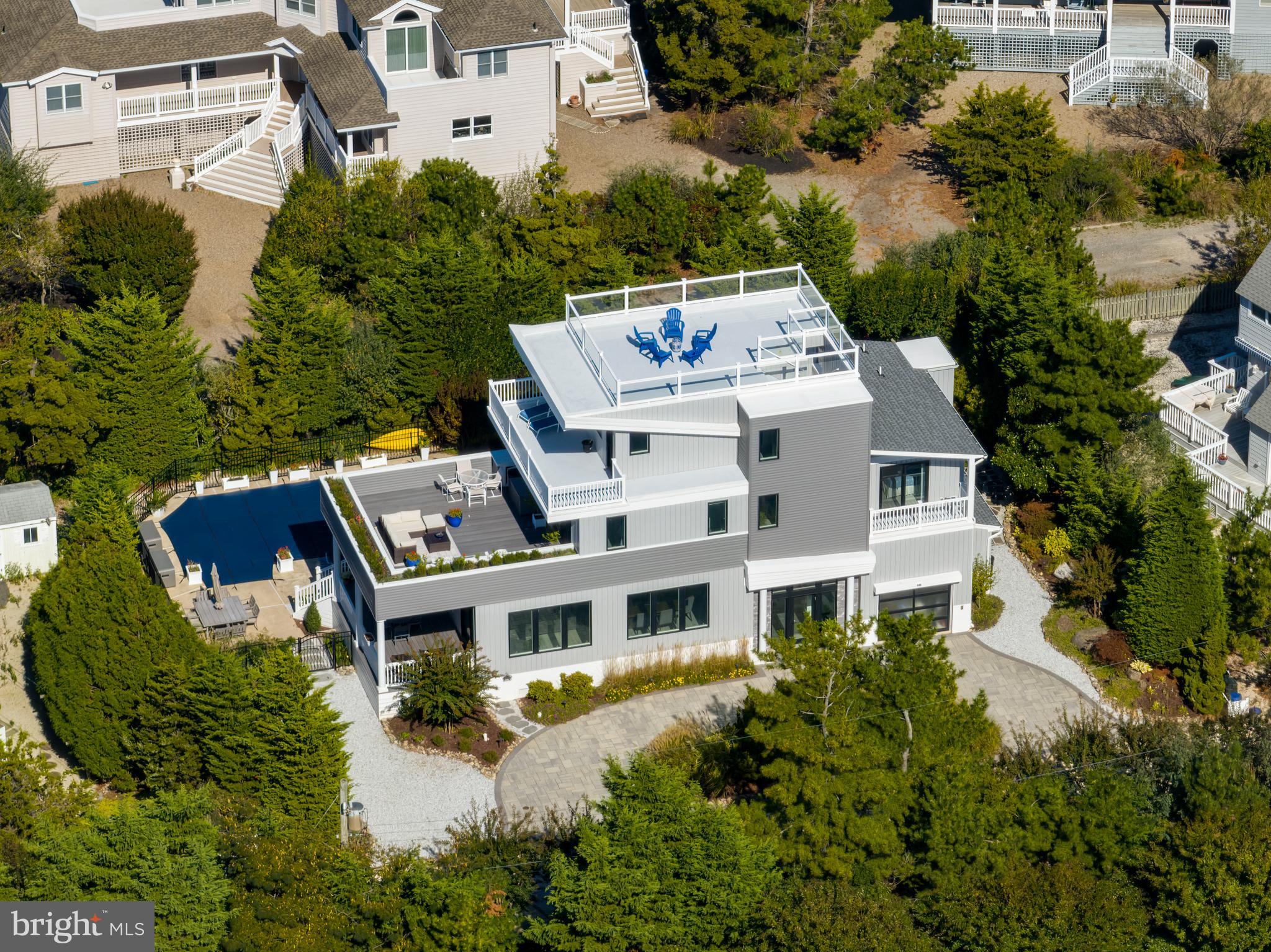 an aerial view of a house with a garden