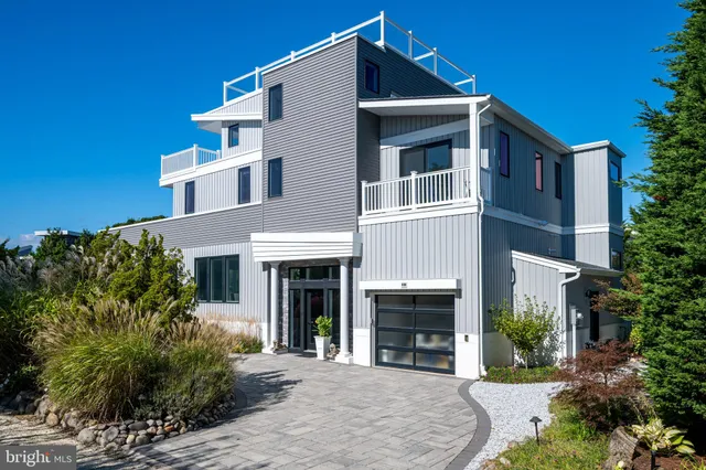 a front view of a house with yard