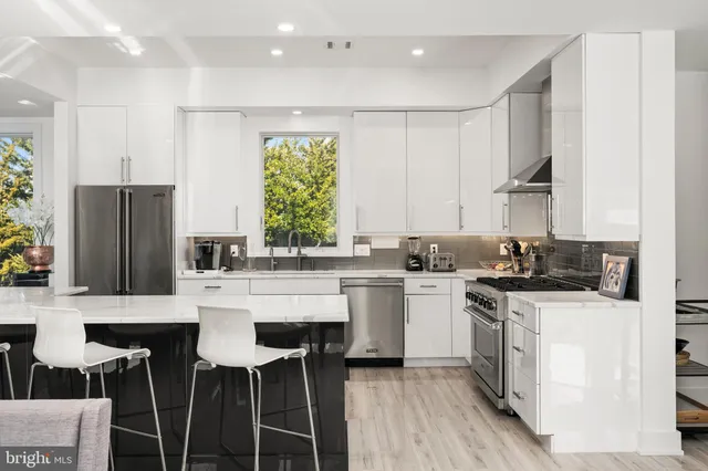a view of balcony with furniture and outdoor seating