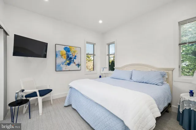 a view of a chairs and table in the patio