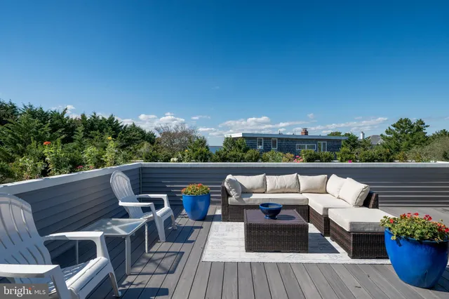 a bathroom with a shower sink and mirror