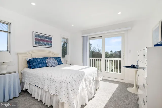 a view of a dinning table and chairs in the patio