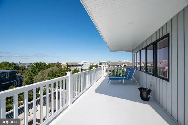 a view of bed and wooden floor
