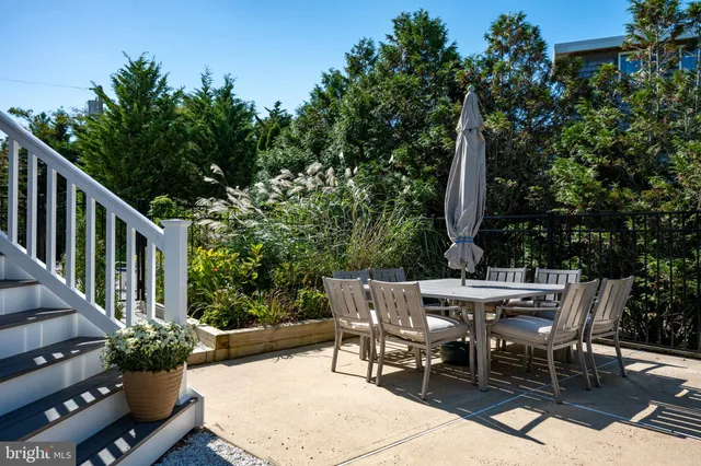 an aerial view of a house with a garden