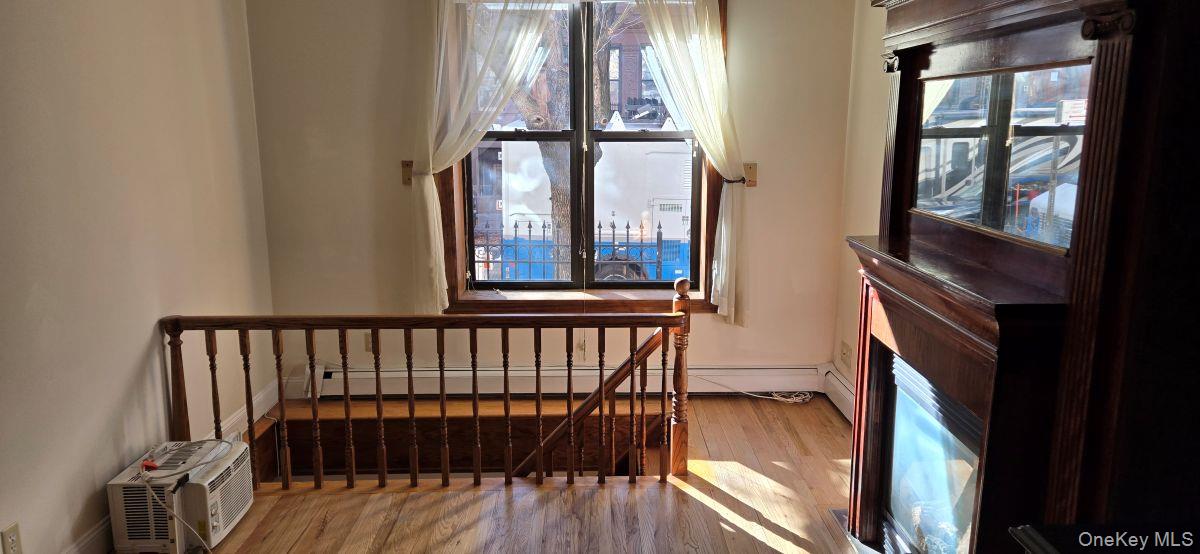 235 West 137th Street, Unit 1F Manhattan, NY 10030 - Photo 4 of 27 a view of staircase with large window