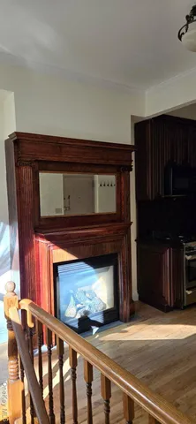 a fireplace with wooden floor