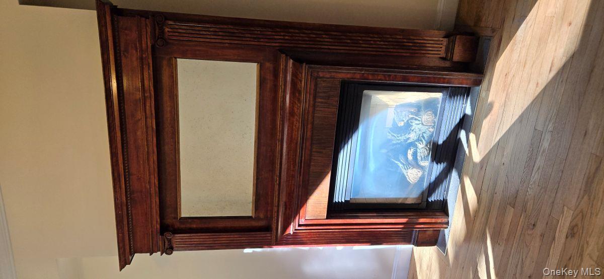 235 West 137th Street, Unit 1F Manhattan, NY 10030 - Photo 10 of 27 a view of fireplace and wooden floor