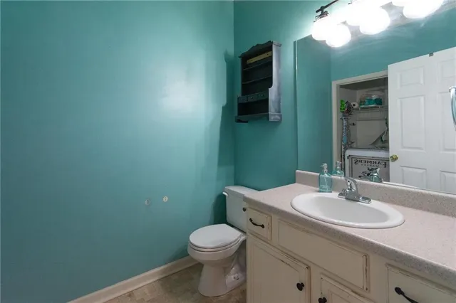 a living room with furniture fireplace and flat screen tv