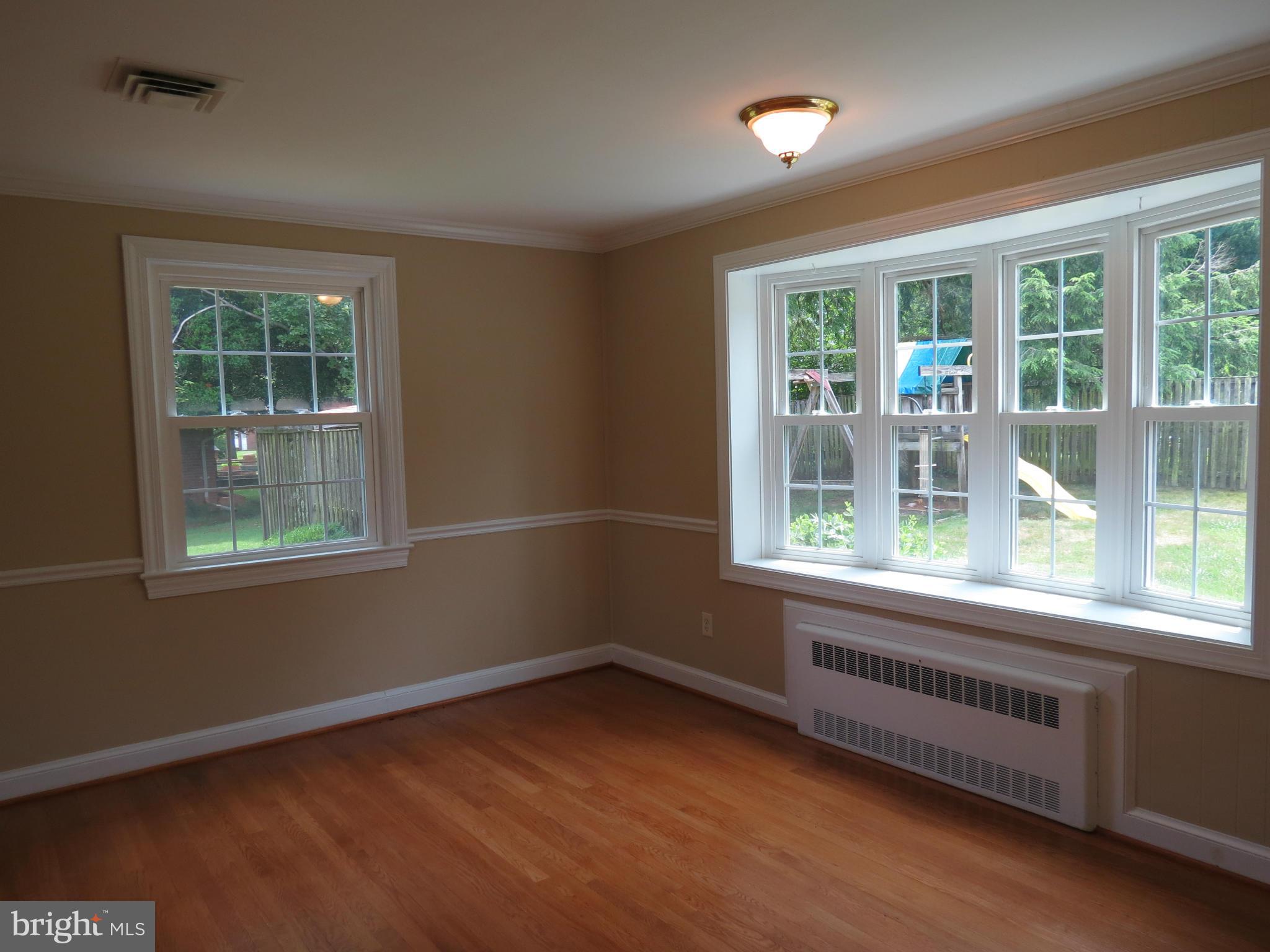 809 Orchard Way Silver Spring, MD 20904 - Photo 22 of 30 an empty room with a window