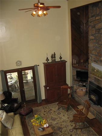 397 Langen Road Lancaster, MA 01523 - Photo 4 of 16 a living room with furniture a rug and a fireplace