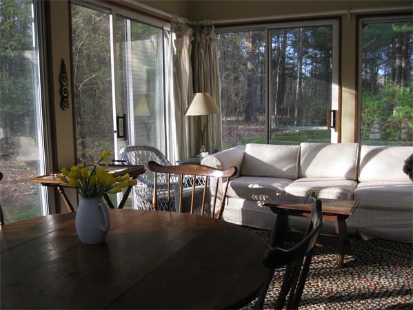 397 Langen Road Lancaster, MA 01523 - Photo 7 of 16 a view of a dining room with furniture window and outside view