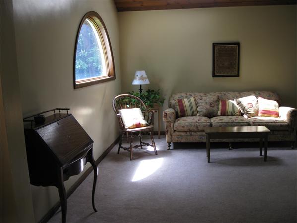 397 Langen Road Lancaster, MA 01523 - Photo 8 of 16 a living room with furniture and a window