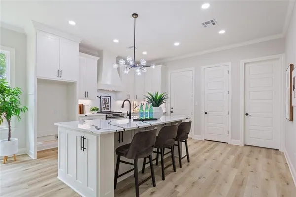 a view of a kitchen and dining table