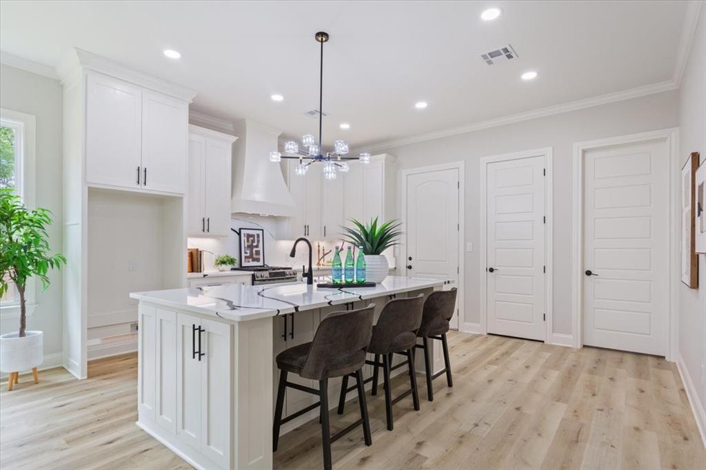 107 North Jena Street Riesel, TX 76682 - Photo 11 of 34 a view of a kitchen and dining table