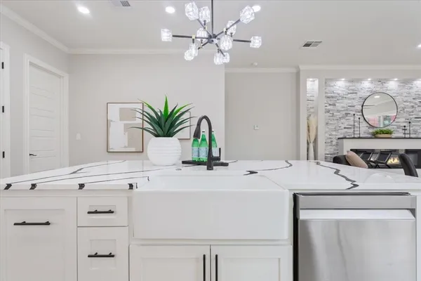 a bathroom with a sink vanity granite and a mirror