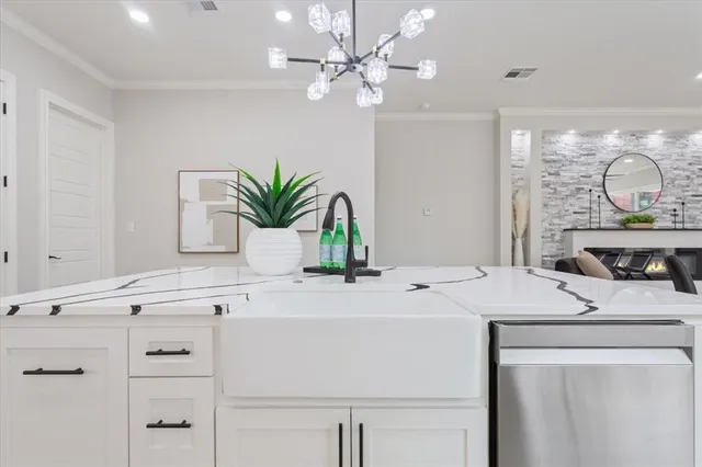 a bathroom with a sink vanity granite and a mirror