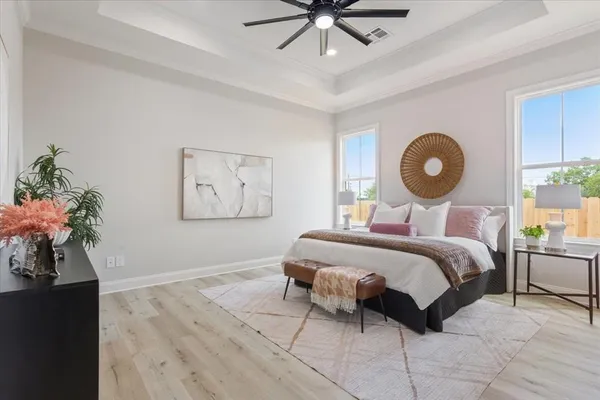 a bedroom with a bed and window