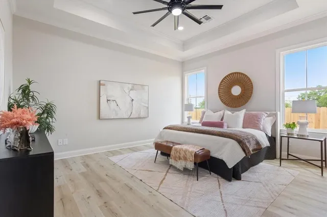 a bedroom with a bed and window