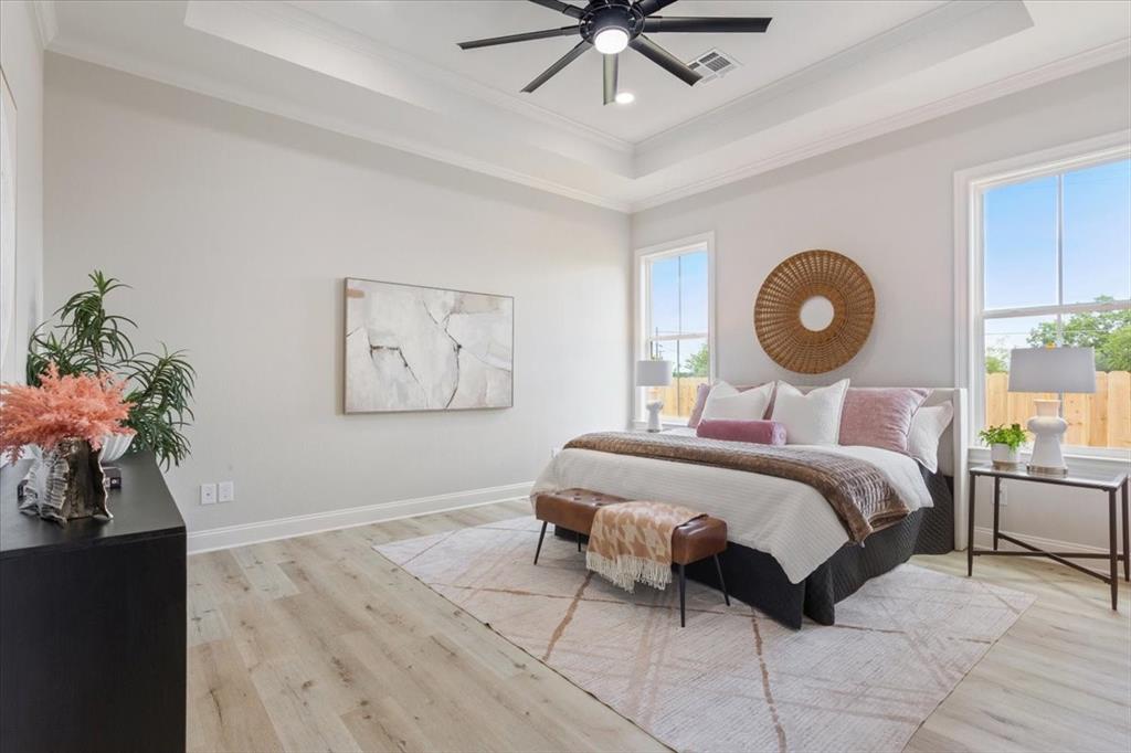 107 North Jena Street Riesel, TX 76682 - Photo 16 of 34 a bedroom with a bed and window