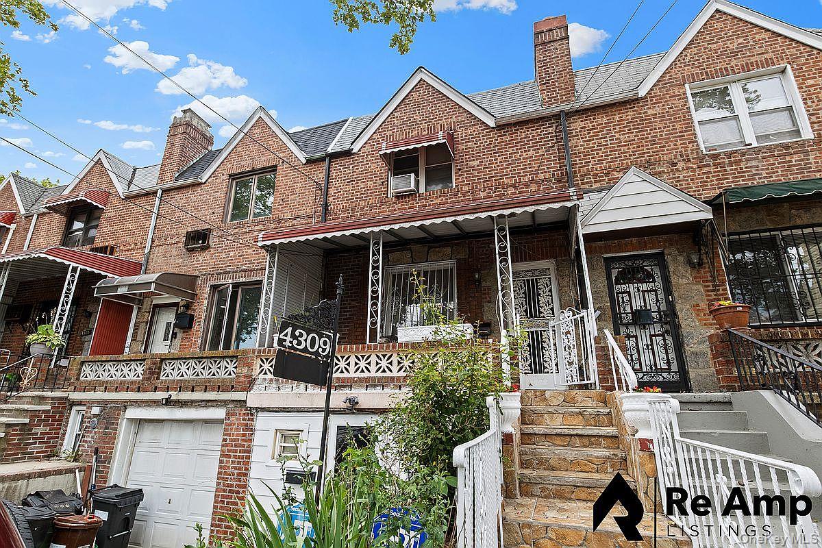 4309 Clarendon Road Brooklyn, NY 11203 - Photo 1 of 1 a front view of a house with glass windows