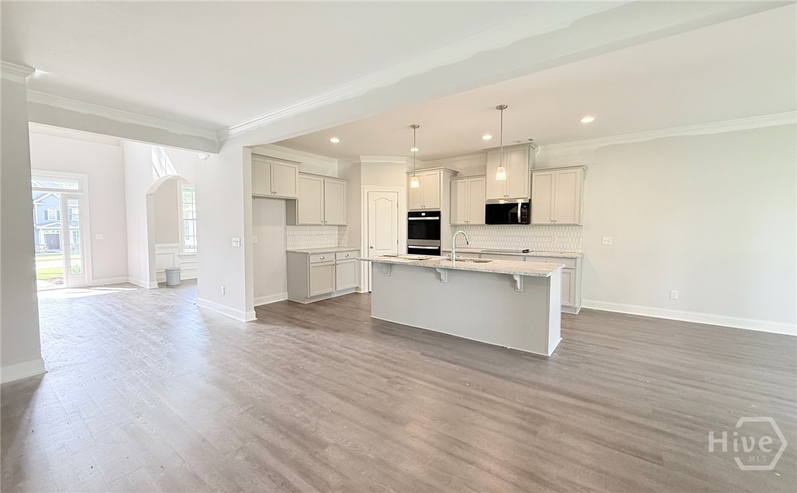 127 Watson Mill Road Guyton, GA 31312 - Photo 6 of 22 Front Entryway/Formal Dining Room/Kitchen/Breakfast Area