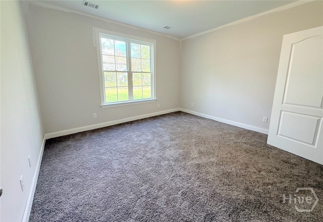 127 Watson Mill Road Guyton, GA 31312 - Photo 10 of 22 Downstairs Bedroom