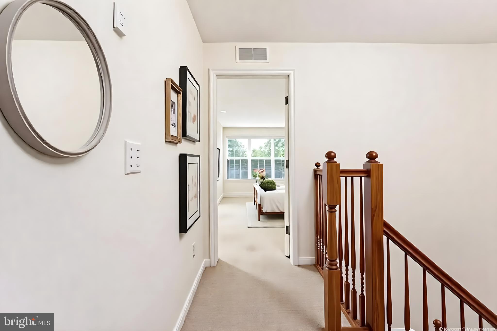 15250 Torbay Way Woodbridge, VA 22191 - Photo 11 of 31 a view of a hallway with wooden floor and entryway