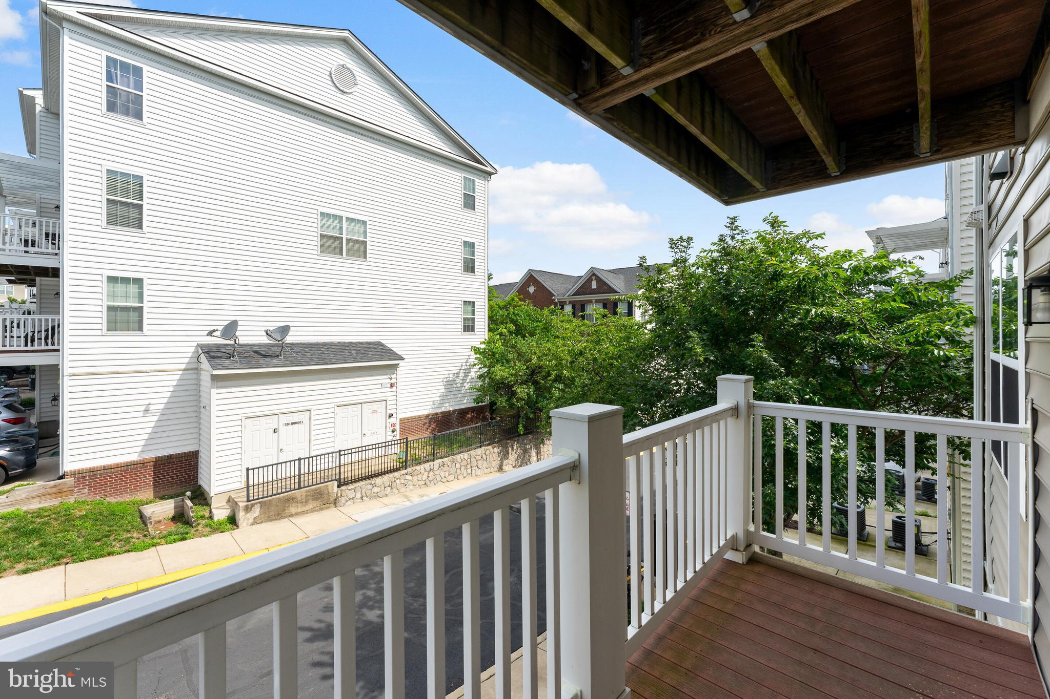 15250 Torbay Way Woodbridge, VA 22191 - Photo 17 of 31 a balcony view with a sink and garden view
