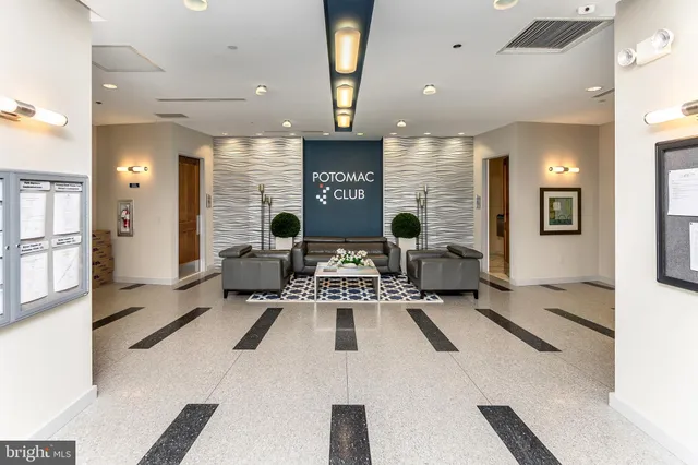 a view of a kitchen with a sink and cabinets