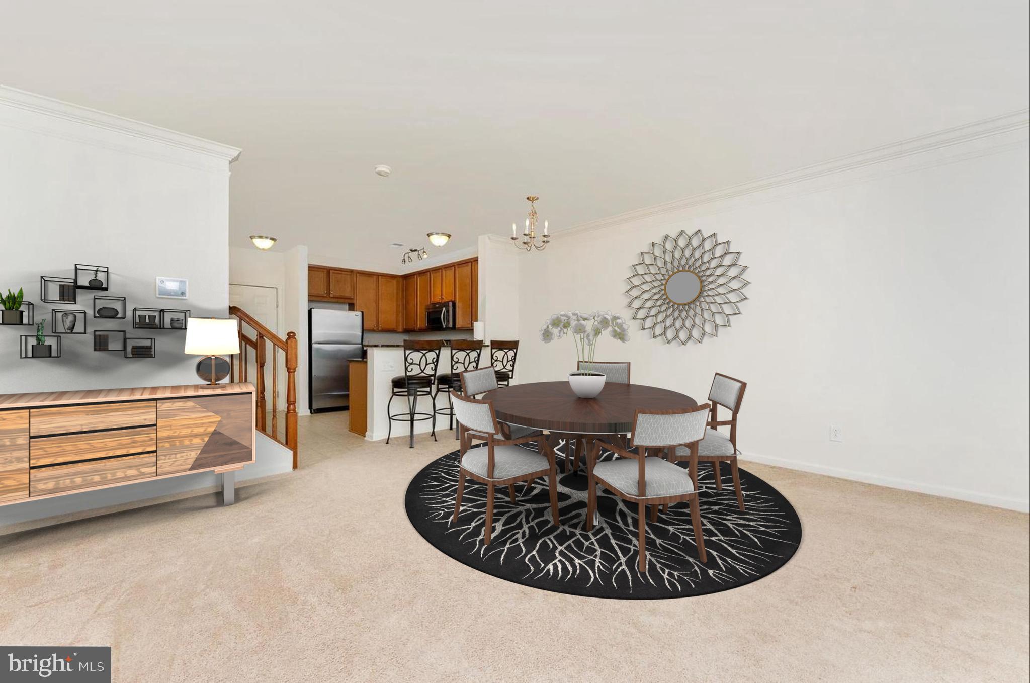 15250 Torbay Way Woodbridge, VA 22191 - Photo 6 of 31 a kitchen with a table and chairs in it