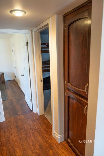 644 Beth Lane Ridgecrest, CA 93555 - Photo 18 of 31 a view of a hallway with wooden floor