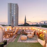 a view of swimming pool with outdoor seating
