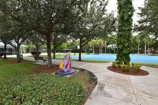 a park view with a tree