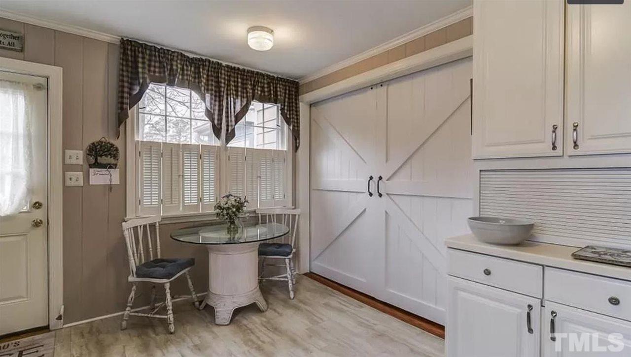 2503 St Marys Street Raleigh, NC 27609 - Photo 6 of 20 Barn door leading from kitchen into 3rd Bedroom/Flexspace