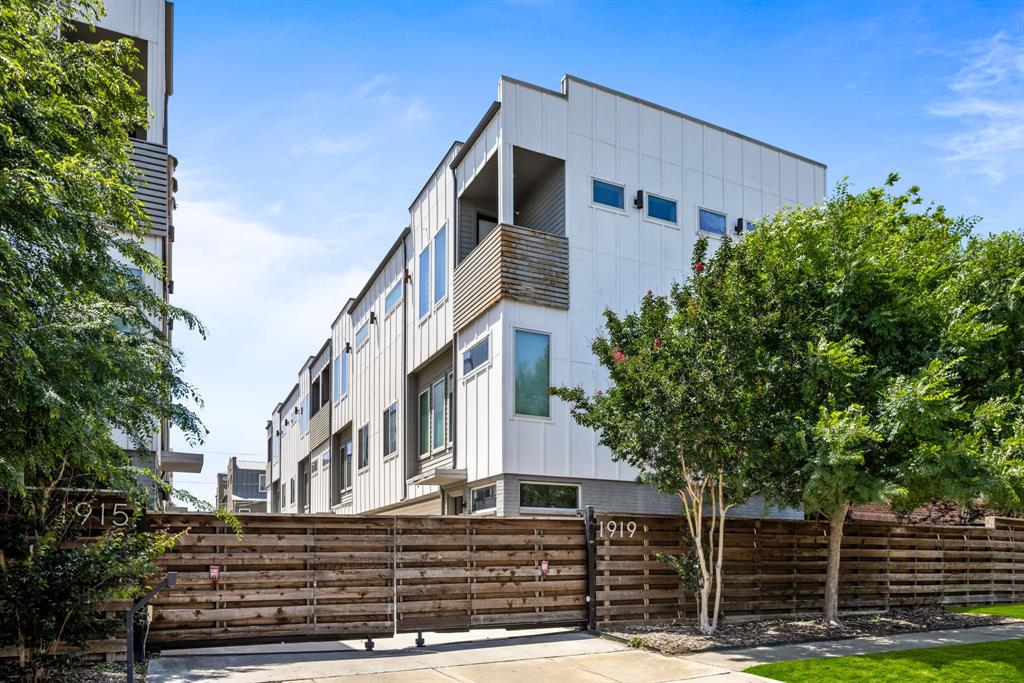 1919 Summit Avenue, Unit 2 Dallas, TX 75206 - Photo 1 of 1 a front view of a house with garden