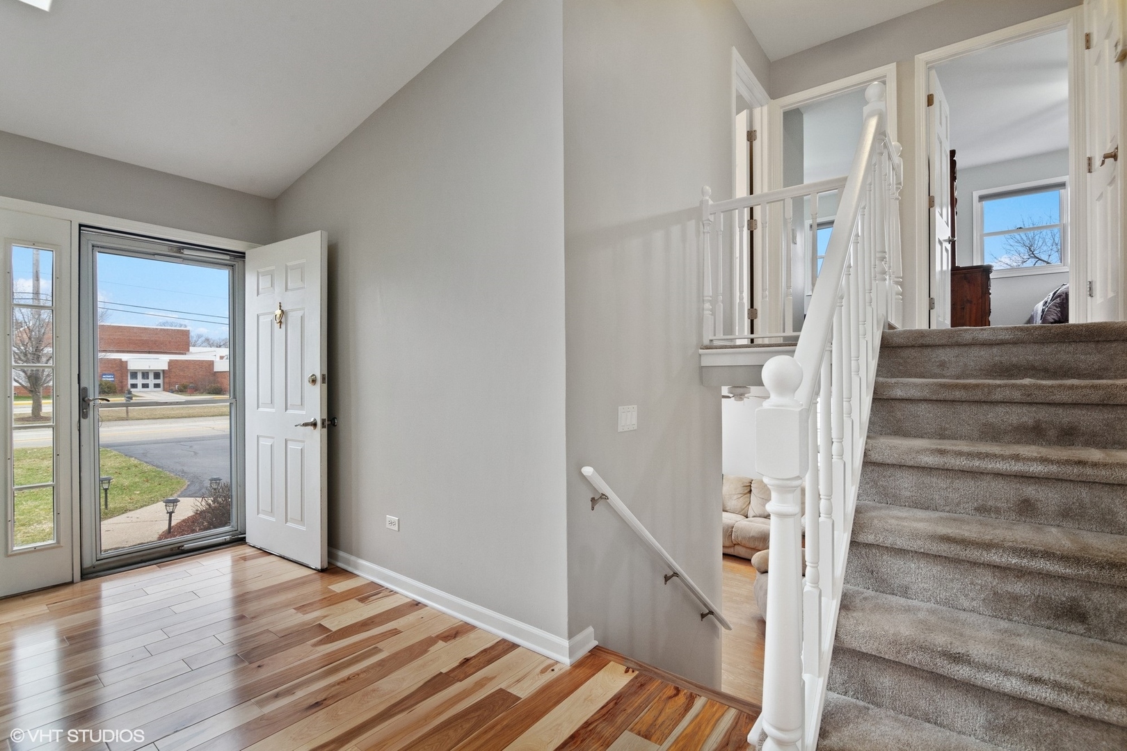 2413 Sand Lake Road Lindenhurst, IL 60046 - Photo 2 of 14 a view of entryway and hall with wooden floor