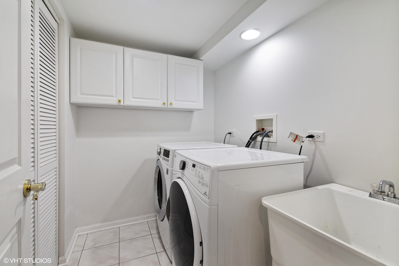 2413 Sand Lake Road Lindenhurst, IL 60046 - Photo 12 of 14 a utility room with dryer and washer