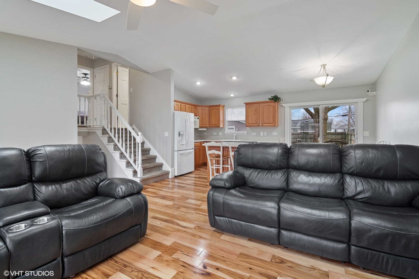 2413 Sand Lake Road Lindenhurst, IL 60046 - Photo 5 of 14 a living room with furniture and a wooden floor