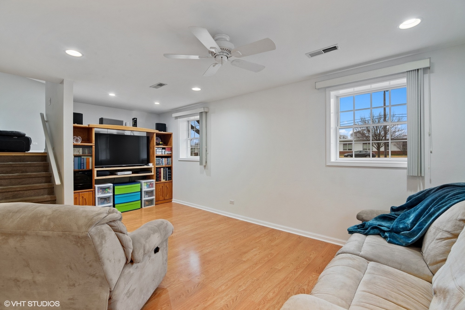 2413 Sand Lake Road Lindenhurst, IL 60046 - Photo 6 of 14 a living room with furniture and a flat screen tv