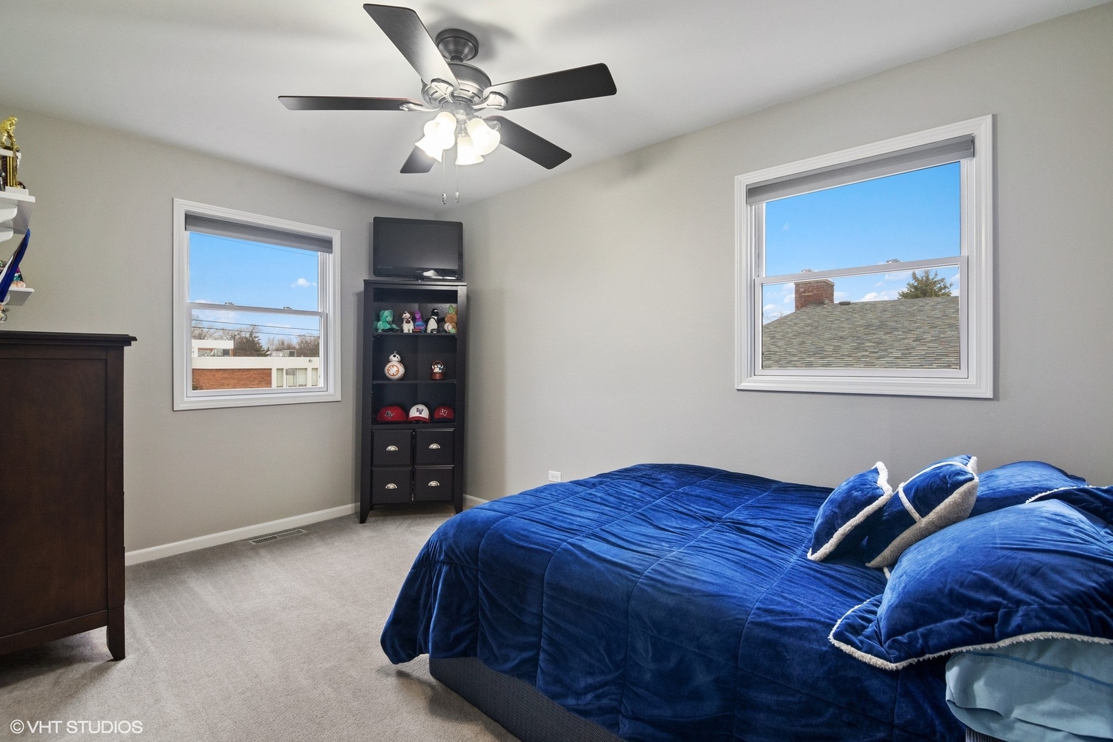 2413 Sand Lake Road Lindenhurst, IL 60046 - Photo 8 of 14 a bed sitting in a bedroom next to a window
