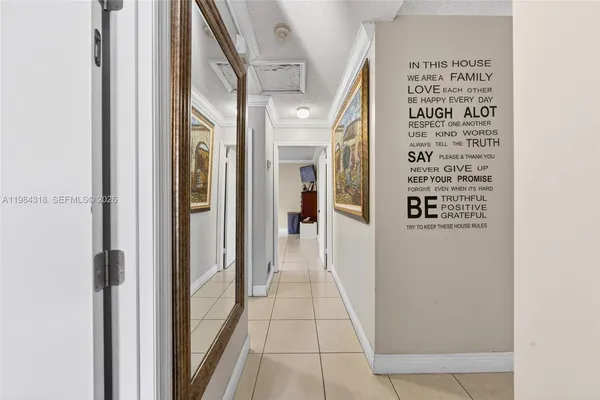 a view of a hallway with a white walls