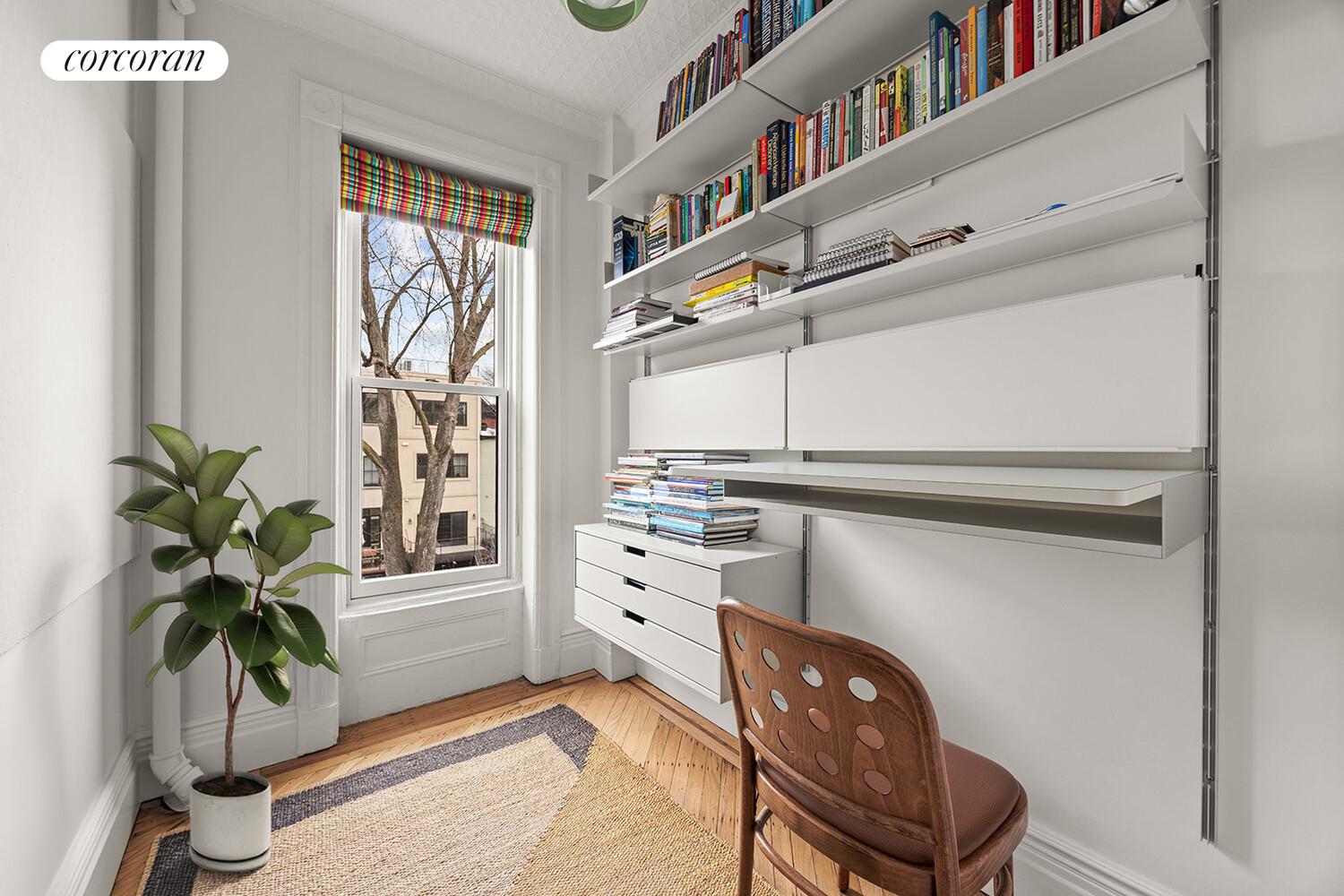 369 6th Street Brooklyn, NY 11215 - Photo 10 of 22 a kitchen with furniture and a potted plant