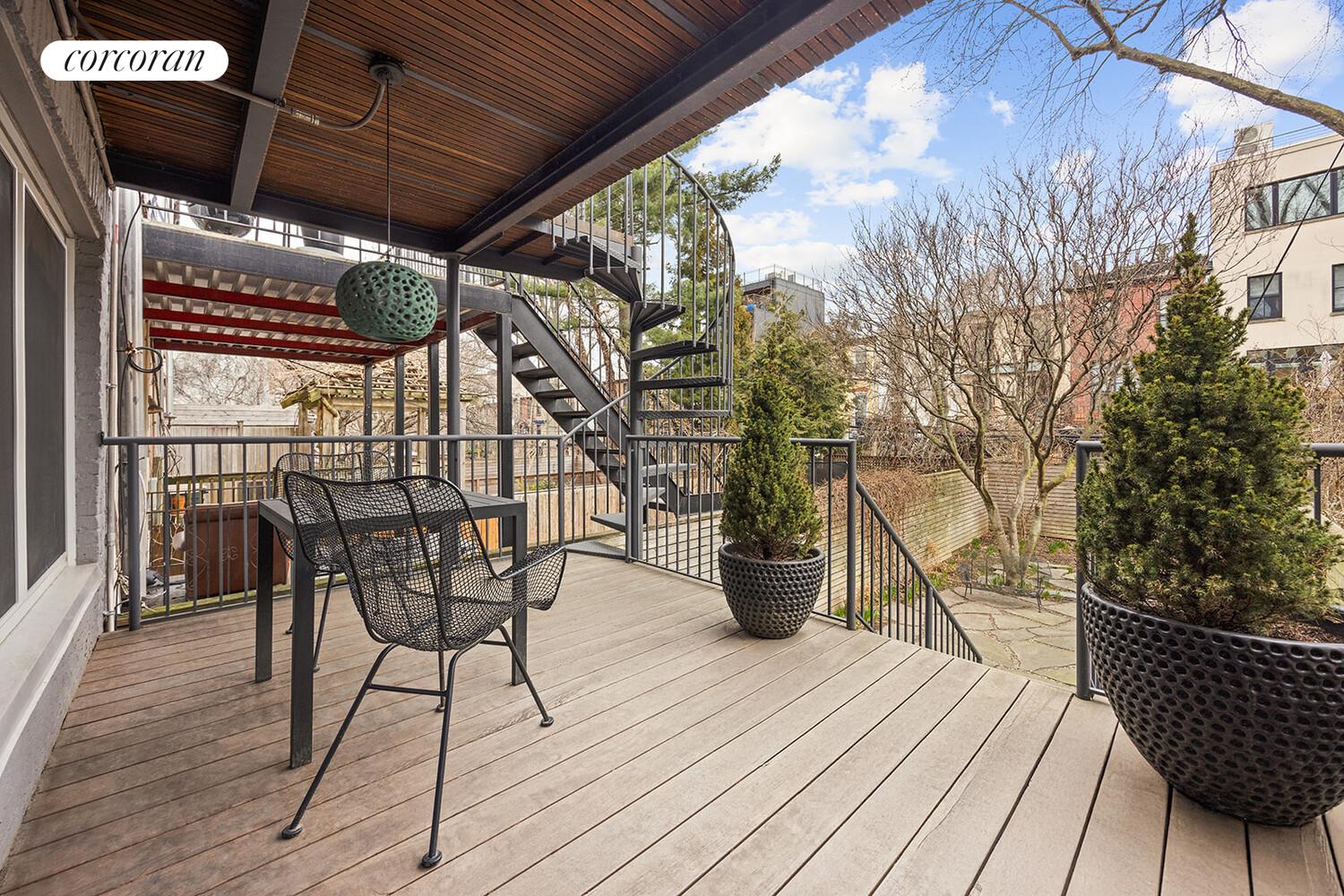 369 6th Street Brooklyn, NY 11215 - Photo 16 of 22 a view of outdoor space with table and chairs
