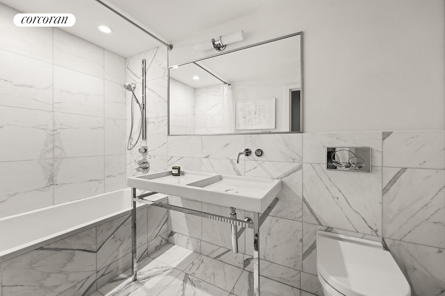 369 6th Street Brooklyn, NY 11215 - Photo 18 of 22 a bathroom with a sink and a mirror