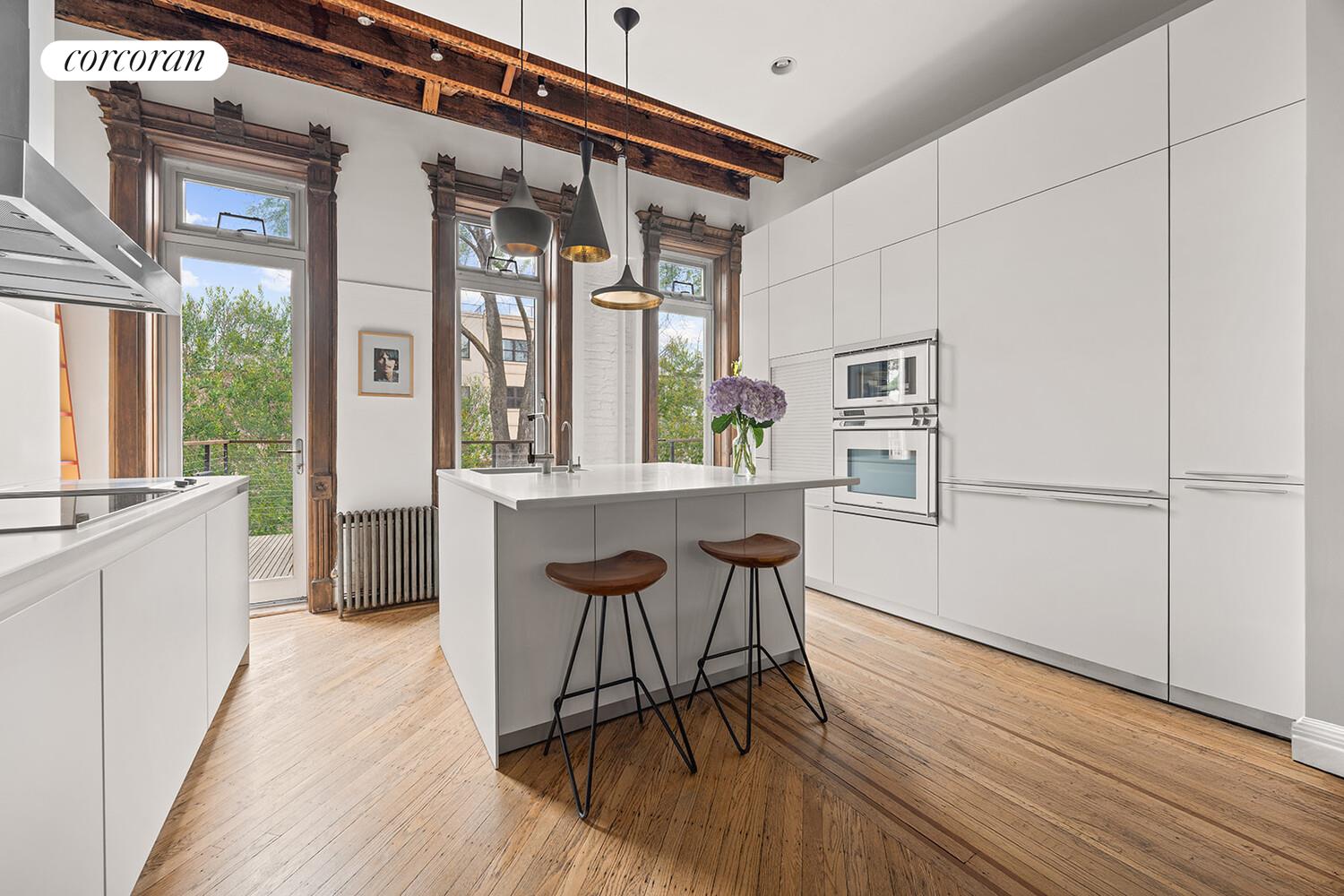 369 6th Street Brooklyn, NY 11215 - Photo 4 of 22 a dining room with furniture and wooden floor