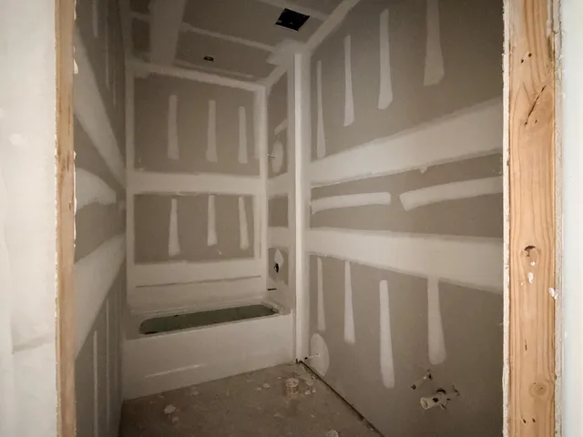 an empty room with windows