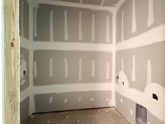 a bathroom with bathtub and shower